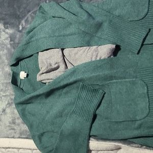 Green cardigan and coul neck shirt